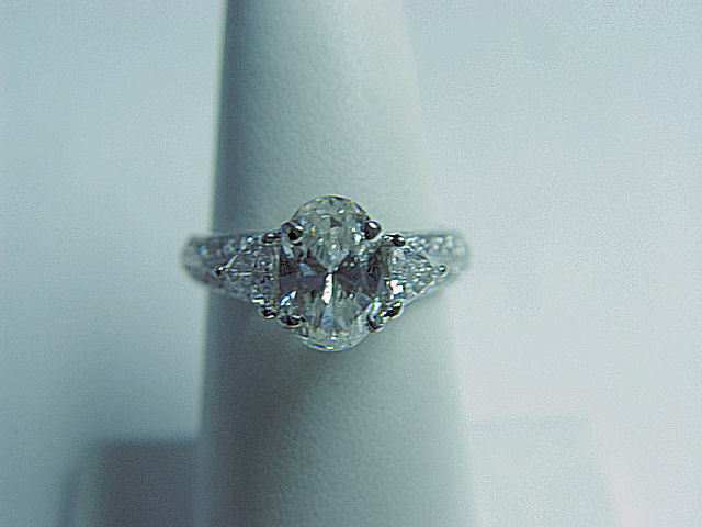 CERTIFIED DIAMOND OVAL SHAPE 8.42X5.70X3.81MM 2 TRILLION ROUND ENGAGEMENT RING