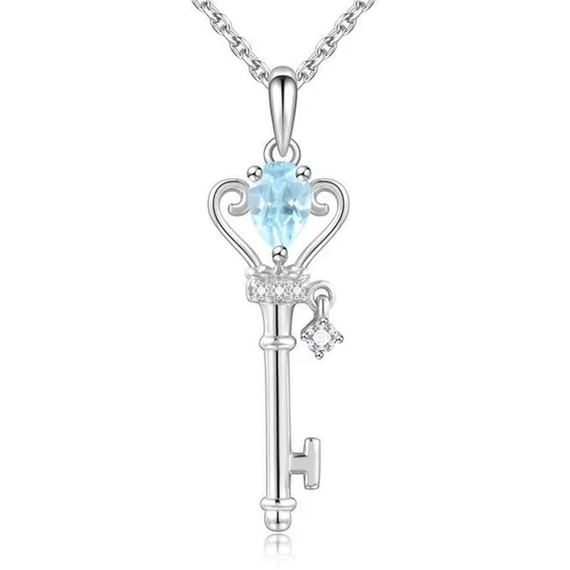 Majesty Diamonds MDS170336 0.75 CTW Oval Blue Topaz Key Pendant Necklace in .925 Sterling Silver with 18K