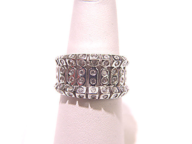 DIAMONDS ARE BEZEL SET ONLY ON TOP BAND