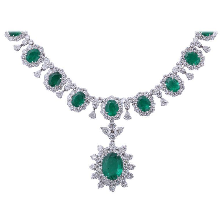 GRACEFUL EMERALD AND DIAMOND NECKLACE. 39.09 CARATS OF FINE GREEN EMERALD