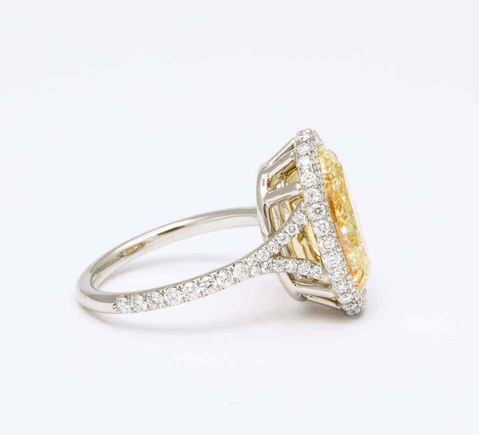 GIA Certified 5 Carat Oval Fancy Yellow Diamond Ring