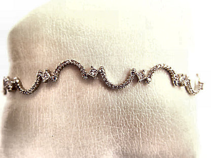 2.48 CT 11 PRINCESS SHAPE DIAMOND SET ROUND BRILLIANT SH DIAMOND SWIRL BRACELET