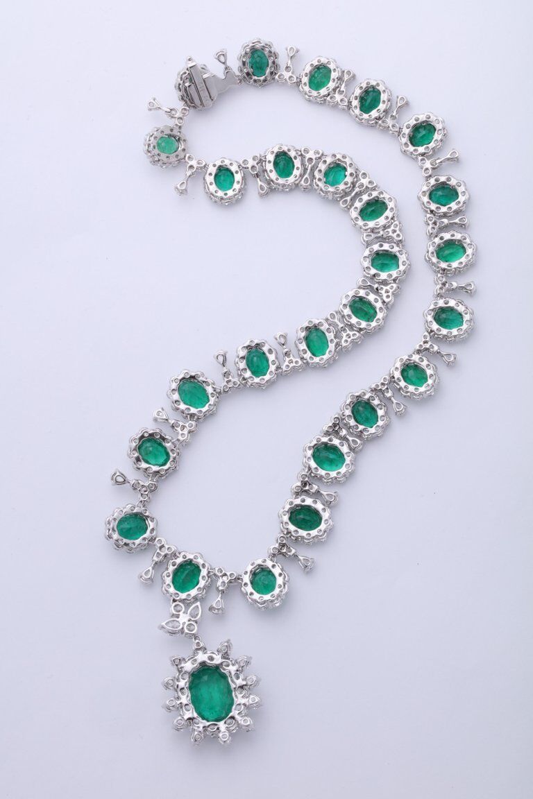 GRACEFUL EMERALD AND DIAMOND NECKLACE. 39.09 CARATS OF FINE GREEN EMERALD