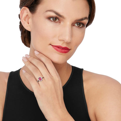 2.20 Carat Simulated Ruby and .20 Ct. T.W. CZ Halo Ring in Sterling Silver
