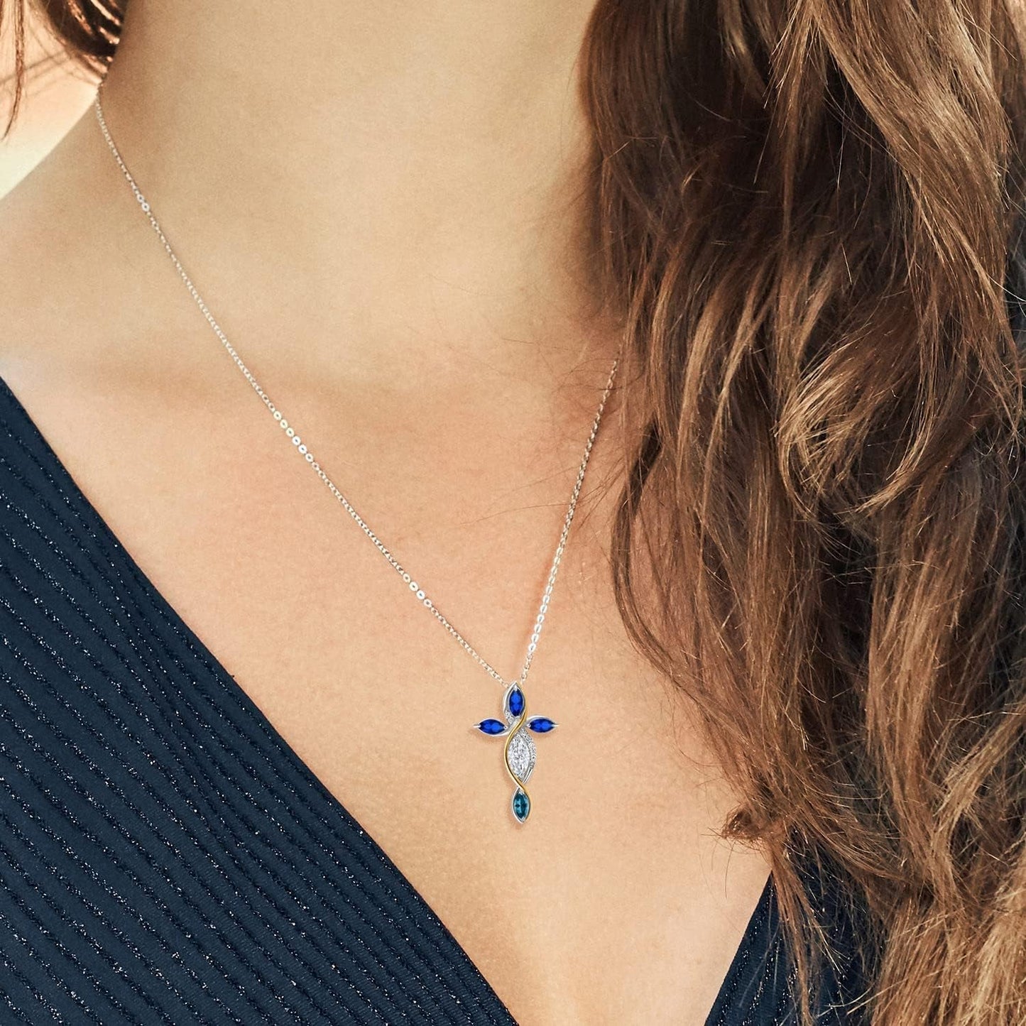 925 Silver and 10K Yellow Gold Blue Created Sapphire Lab Grown Diamond Cross Pendant with Chain Set with Moissanite (1.45 Cttw)
