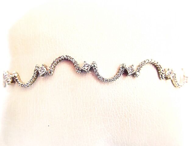 2.48 CT 11 PRINCESS SHAPE DIAMOND SET ROUND BRILLIANT SH DIAMOND SWIRL BRACELET