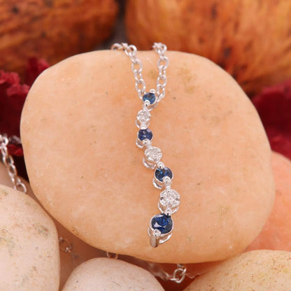 10K Gold round White Diamond & Blue Sapphire Ladies Graduating Journey of Life Pendant