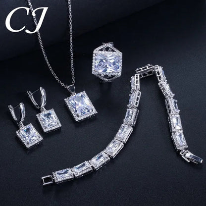 CANDICE Sparkling Princess Cut Clear Crystal Pave Stylish Sterling Silver Necklace Earrings Bracelet and Ring 4 Pcs Wedding Jewelry Set With Tiny CZ Stone
