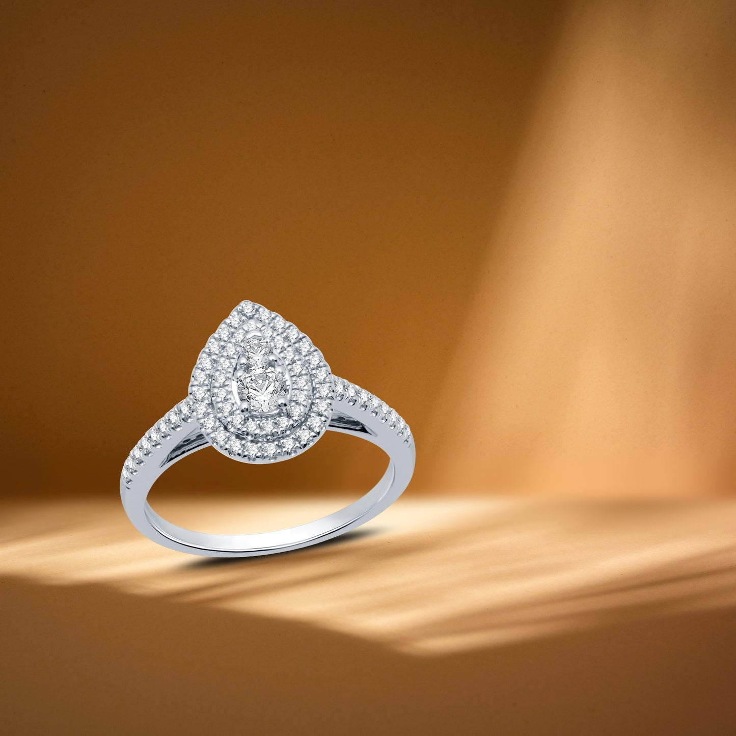 1/2 CTTW Diamond Women'S Pear Halo Engagement Ring 10K White Gold
