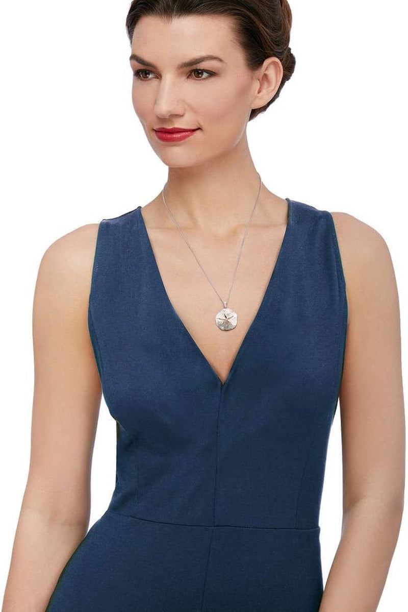 0.10 Ct. T.W. Diamond Sand Dollar Necklace in Sterling Silver and 14Kt Yellow Gold