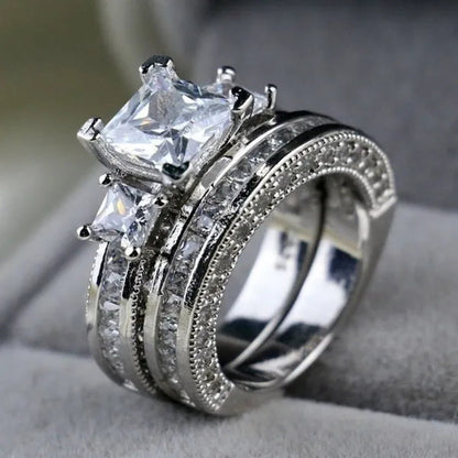 YOHAPP NEW Fashion Couple Rings Set Jewelry - Men's 8mm 316L Stainless Steel Titanium Ring and Women's Three Stone Princess Cut 1CT Diamond   Silver  Bridal Wedding Engagement Band Ring
