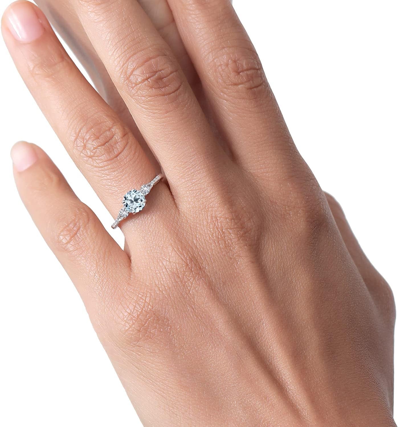 10K White Gold Sky Blue Topaz White Created Sapphire and White Diamond Accent 3-Stone Engagement Ring for Women (1.05 Cttw, round 6MM, Gemstone November Birthstone)